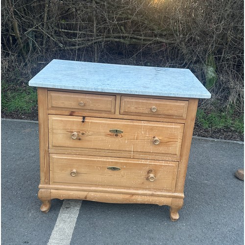 343 - 2 over 2 french stripped pine marble chest of drawers measures approximately 30 inches wide 33 inche... 