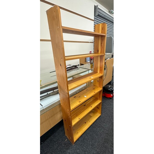 334 - 6 Shelf pine book case measures approximately 71 inches tall 13 inches wide 9 inches depth