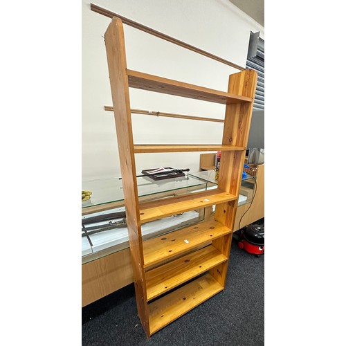 334 - 6 Shelf pine book case measures approximately 71 inches tall 13 inches wide 9 inches depth