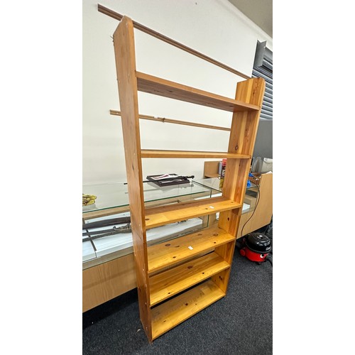 334 - 6 Shelf pine book case measures approximately 71 inches tall 13 inches wide 9 inches depth