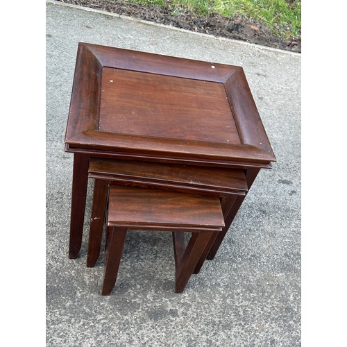 321 - Mahogany nest of three tables