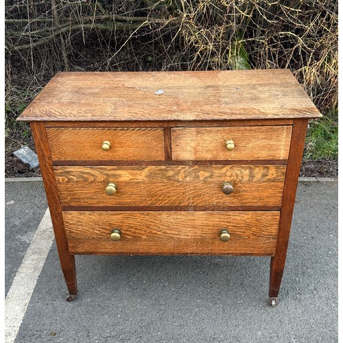 316 - 2 Over 2 antique oak chest of drawers measures approximately 32 inches tall 36 inches wide 18 inches... 