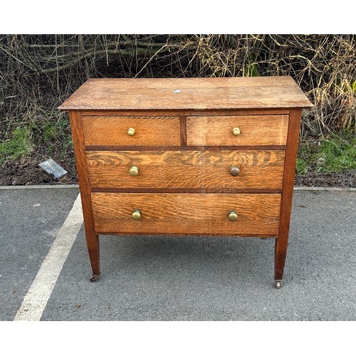 316 - 2 Over 2 antique oak chest of drawers measures approximately 32 inches tall 36 inches wide 18 inches... 