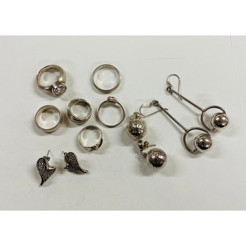 388 - Six silver rings and 3 pairs of earrings weight approx 66g