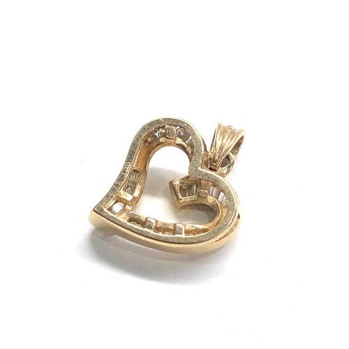 396 - 9ct gold diamond heart pendant 0.25ct diamonds weight 2g