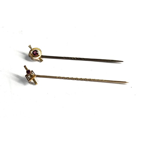 401 - 2 9ct gold garnet stick pins