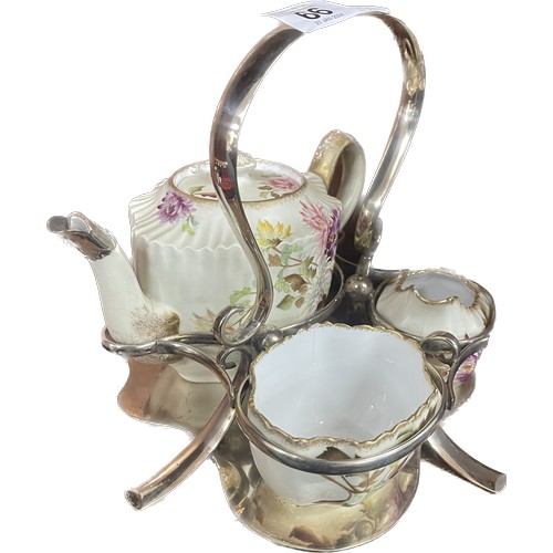 66 - Carlton ware tea pot milk jug and sugar bowl in a silver plated stand