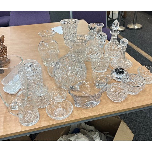 134 - Selection of glassware to include vases, decanters etc