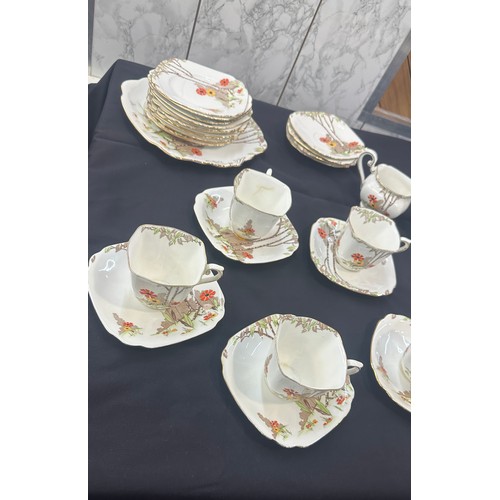 191 - Standard china part tea service to include cups, saucers, sugar bowl etc