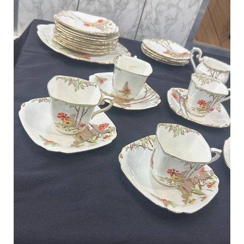 191 - Standard china part tea service to include cups, saucers, sugar bowl etc