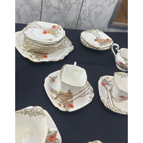 191 - Standard china part tea service to include cups, saucers, sugar bowl etc