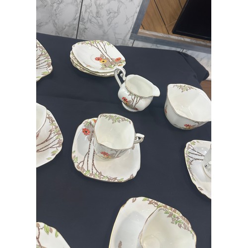 191 - Standard china part tea service to include cups, saucers, sugar bowl etc