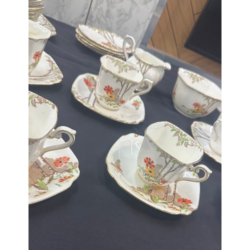 191 - Standard china part tea service to include cups, saucers, sugar bowl etc