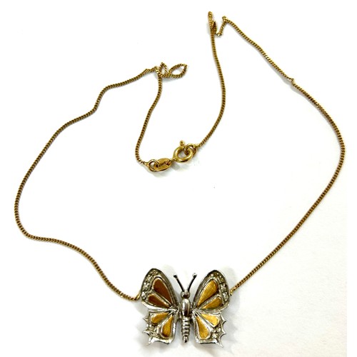 452 - 18ct gold ladies choker necklace with 18ct gold and diamond butterfly pendant, overall weight 6.6g