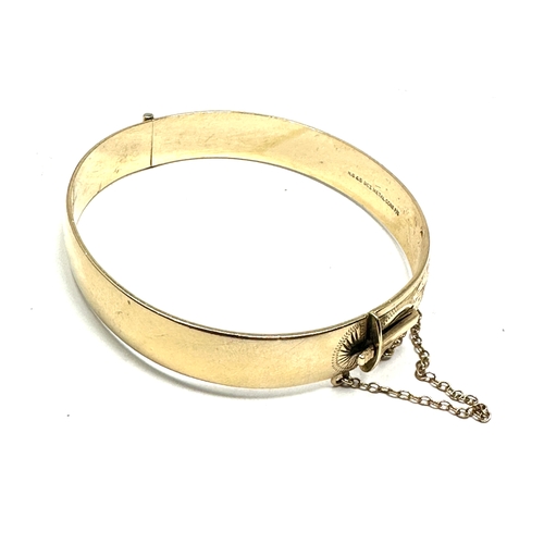 81 - vintage 9ct gold metal core bangle weight 24g