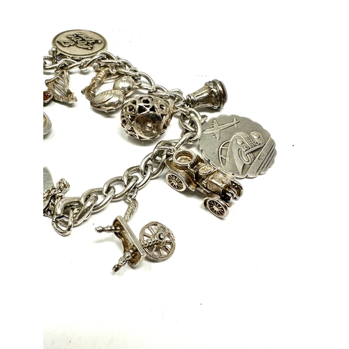 267 - Vintage silver charm bracelet weight 52g