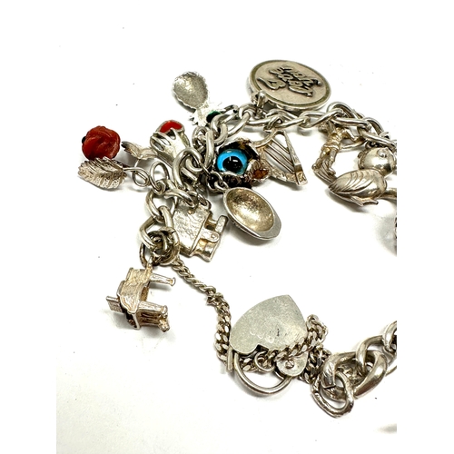 267 - Vintage silver charm bracelet weight 52g