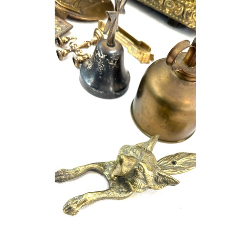 296 - Brass slipper box with a selection of brass ware