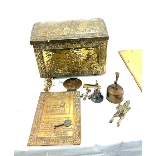 296 - Brass slipper box with a selection of brass ware