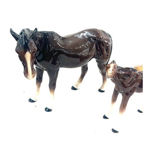 605 - Large Melba pottery horse and 1 other 11 inches tall 15 inches wide