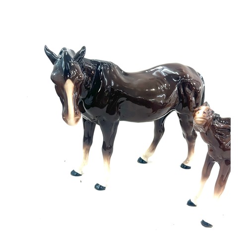 605 - Large Melba pottery horse and 1 other 11 inches tall 15 inches wide