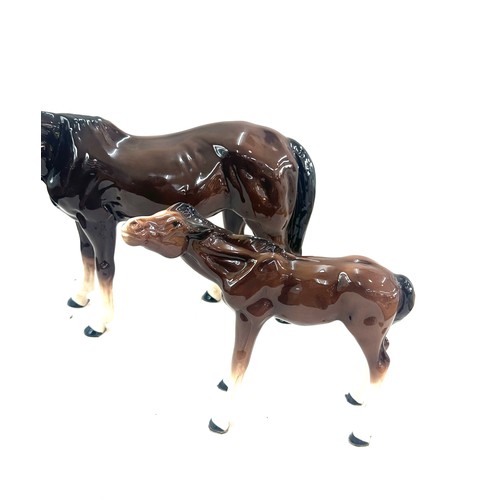 605 - Large Melba pottery horse and 1 other 11 inches tall 15 inches wide