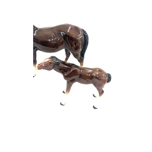 605 - Large Melba pottery horse and 1 other 11 inches tall 15 inches wide