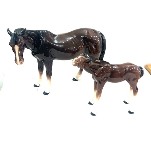 605 - Large Melba pottery horse and 1 other 11 inches tall 15 inches wide