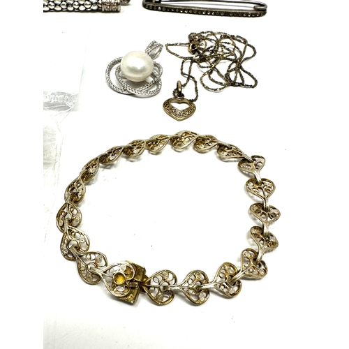 276 - selection of silver jewellery includes pendant & bracelet earrings etc weight 90g