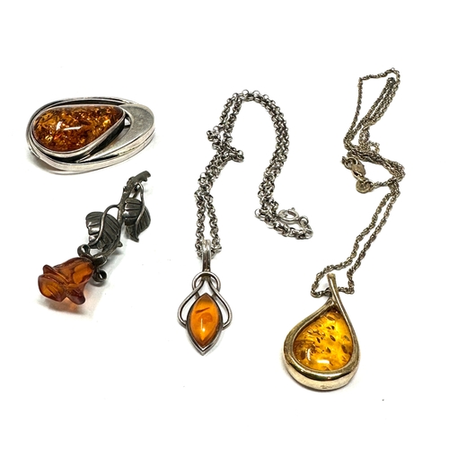 279 - selection of silver & amber jewellery brooches & pendant necklaces weight 26g