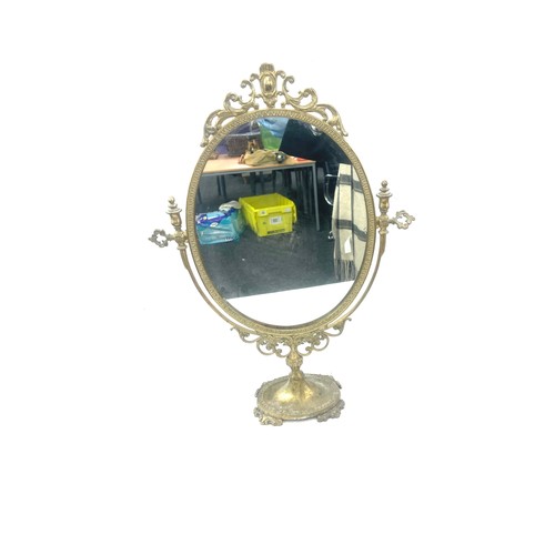 255 - Gilt framed mirror measures approximately 22 inches tall 16 inches wide