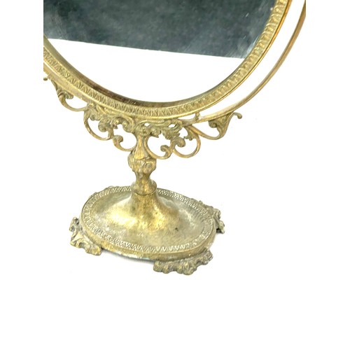 255 - Gilt framed mirror measures approximately 22 inches tall 16 inches wide