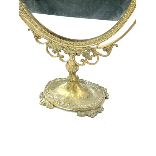 255 - Gilt framed mirror measures approximately 22 inches tall 16 inches wide