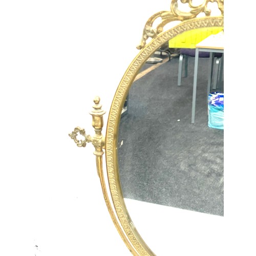 255 - Gilt framed mirror measures approximately 22 inches tall 16 inches wide