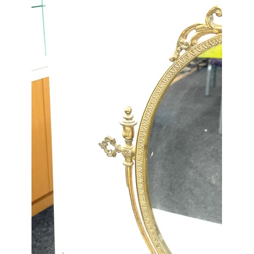 255 - Gilt framed mirror measures approximately 22 inches tall 16 inches wide