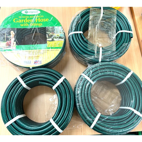 244 - Four 30 metre hose pipes