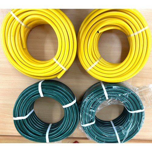 291 - Four 30 metre hose pipes