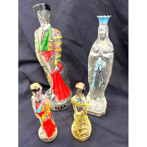 446 - Selection of spanish novelty decanters tallest measures 12 inches