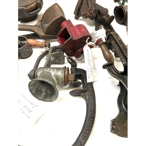 194 - Selection vintage tools to include a fruit press, knife sharpener, Potato ricer, meat grinder etc