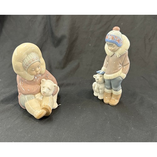 597 - Lladro Eskimo / Inuit children with polar bears, both in good overall condition