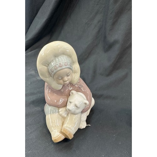 597 - Lladro Eskimo / Inuit children with polar bears, both in good overall condition