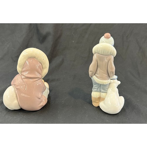 597 - Lladro Eskimo / Inuit children with polar bears, both in good overall condition