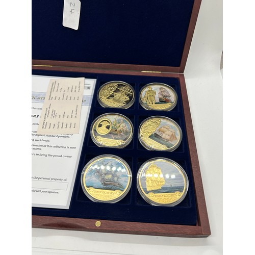 433 - Cased presentation of 6 Silver plated HMS victory coins / medals with COA