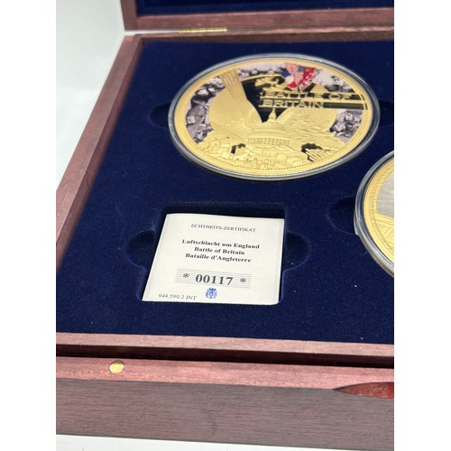 431 - Cased set of silver plated commemorative Pearl Harbour large coins / medals, limited edition