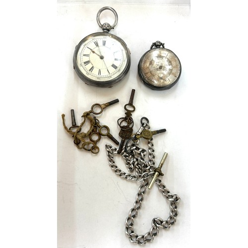 555 - Vintage silver pocket watch and a ladies silver fob watch along with a silver Albert chain