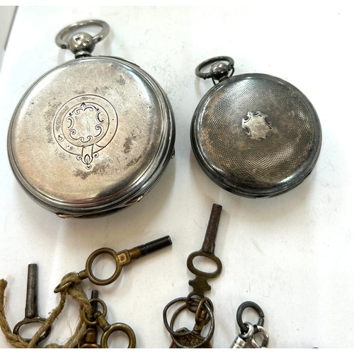 555 - Vintage silver pocket watch and a ladies silver fob watch along with a silver Albert chain