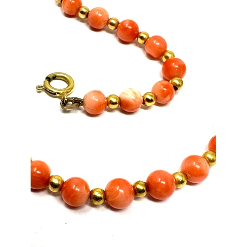 62 - 9ct gold coral & gold bead choker necklace measures approx 40 cm long weight 11.5g