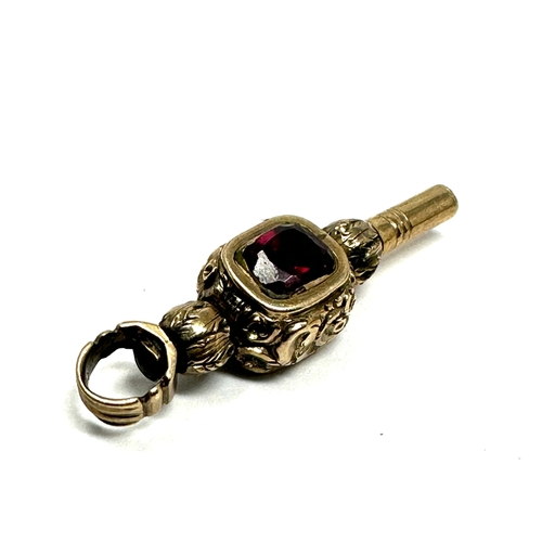 63 - Antique gold & gemstone set pocket watch key measures approx 3cm  weight 3.5g