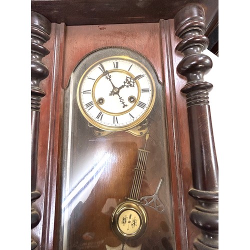 81 - Vintage mahogany 2 key hole Vienna wall clock with pendulum and key, in working order chimes on the ... 