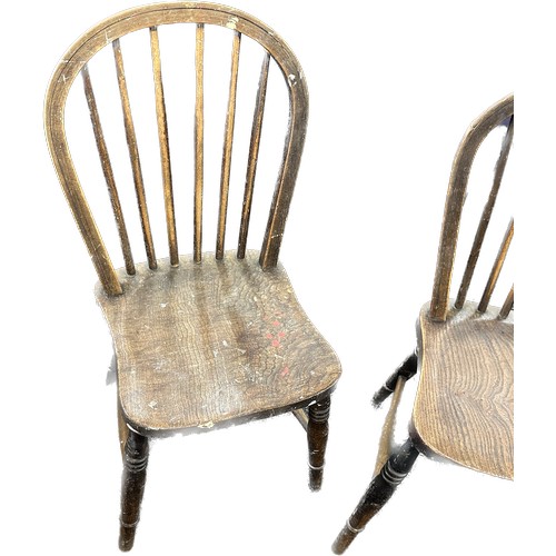 397 - Pair of antique elm stick back kitchen chairs